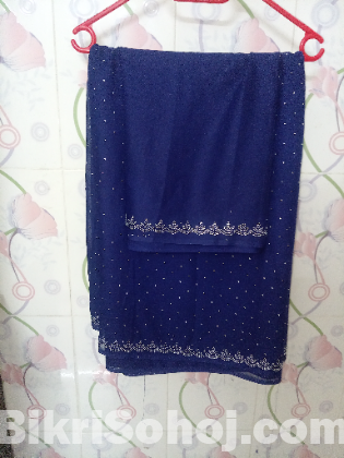 Blue full stonework saree with unstiched blows